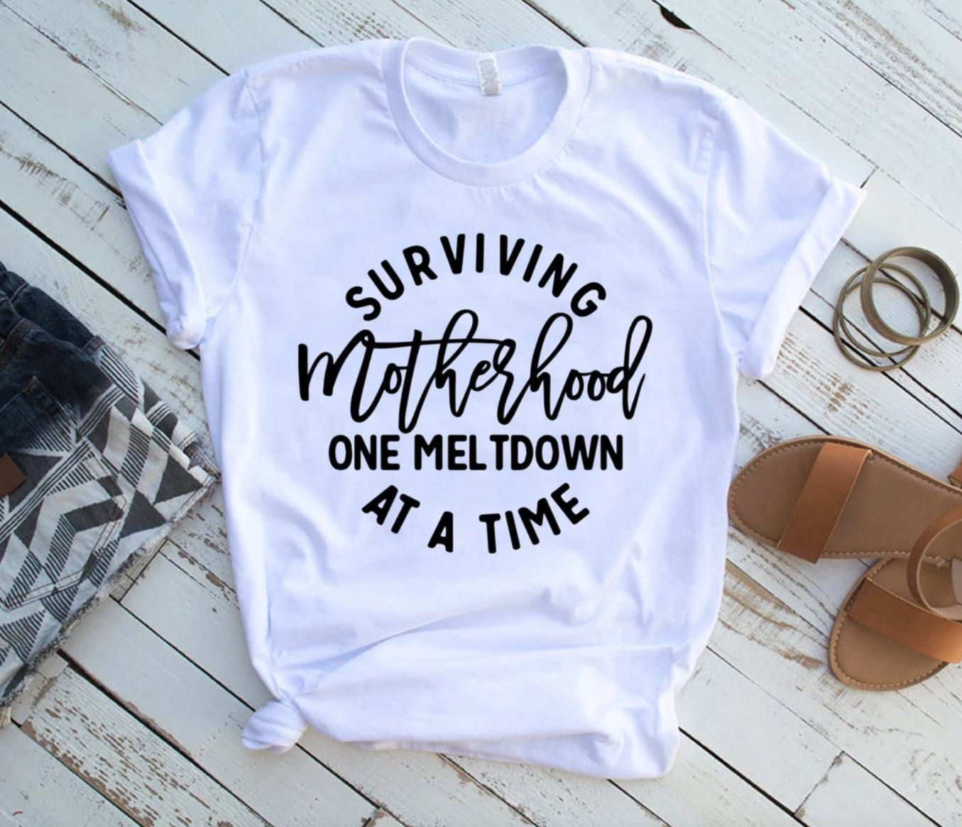 Surviving Motherhood One Meltdown At A Time Tee | Mom Life Tee | Mom Funny Tee | Motherhood Tee | Various Print Colors